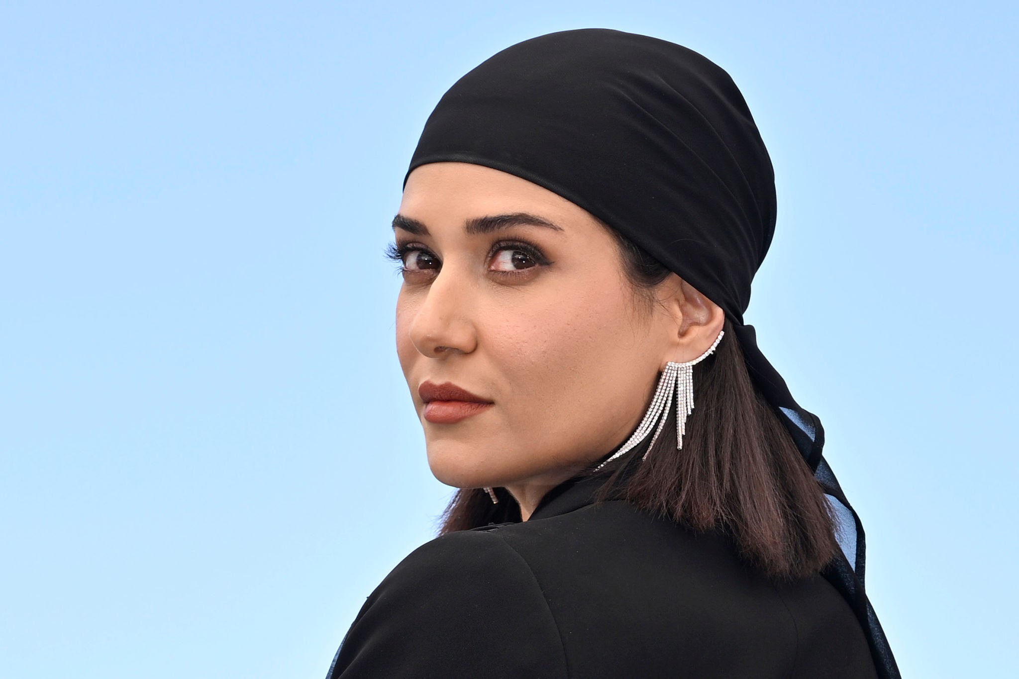 CANNES, FRANCE - MAY 23: Parinaz Izadyar attend the "Zan O Bacheh" (Woman And Child) photocall at the 78th annual Cannes Film Festival at Palais des Festivals on May 23, 2025 in Cannes, France. (Photo by Stephane Cardinale - Corbis/Corbis via Getty Images)